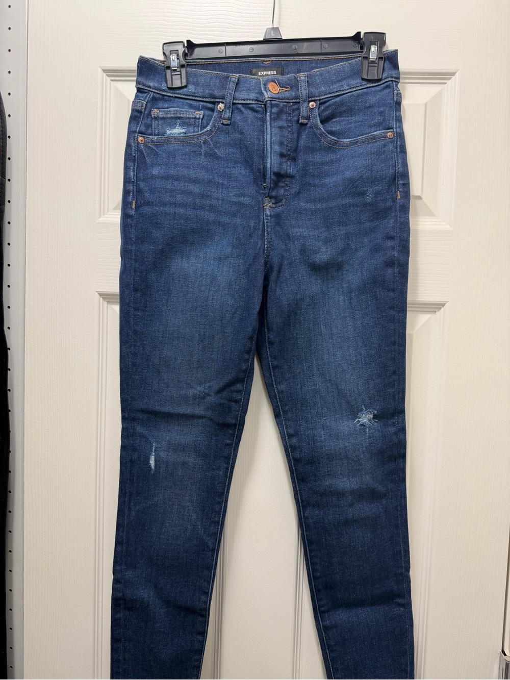 Express Women's Dark Blue Skinny Jeans with Light Distress